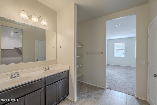 bathroom featuring tile patterned floors and vanity