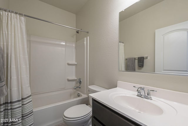 full bathroom with vanity, toilet, and shower / bath combo with shower curtain