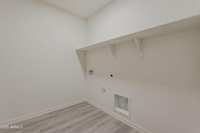 40030 W Bunker Dr, Maricopa, AZ 85138 - washroom with baseboards, washer hookup, light wood-type flooring, laundry area, and gas dryer hookup