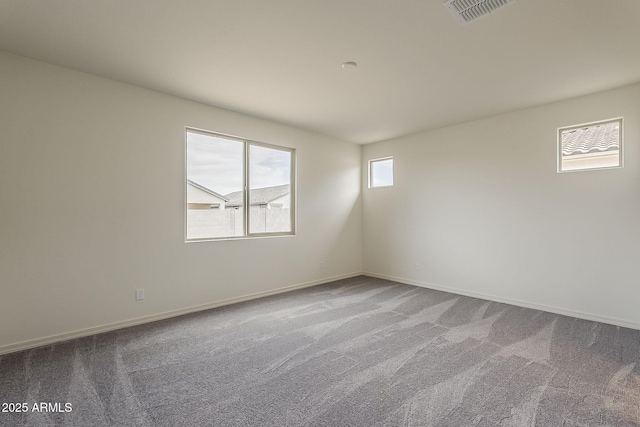 40030 W Bunker Dr, Maricopa, AZ 85138 - carpeted empty room with visible vents and baseboards