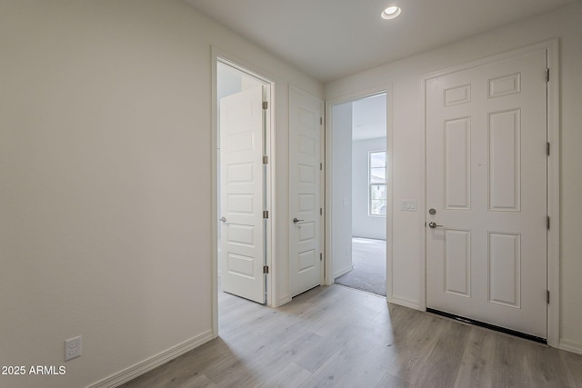 40030 W Bunker Dr, Maricopa, AZ 85138 - foyer entrance featuring light wood-style floors, baseboards, and recessed lighting