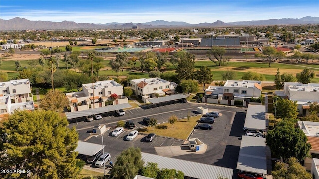 drone / aerial view featuring a mountain view