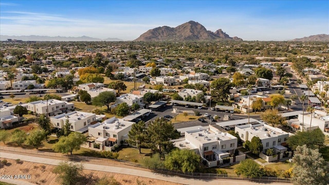 birds eye view of property featuring a mountain view