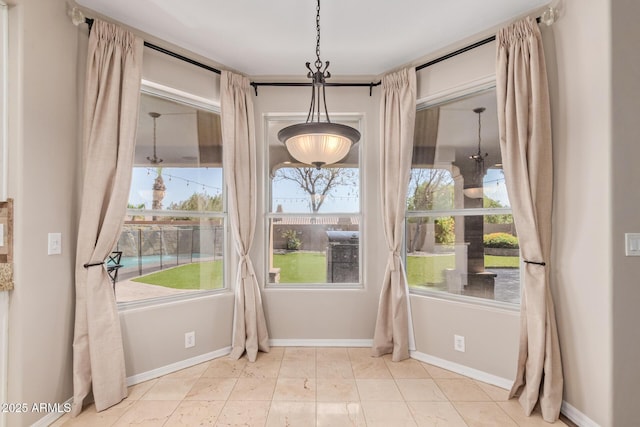 1211 E Desert Flower Ln, Phoenix, AZ 85048 - unfurnished dining area with baseboards