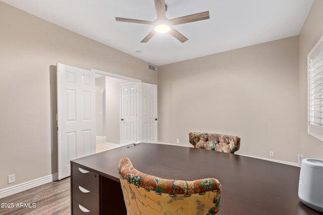 1211 E Desert Flower Ln, Phoenix, AZ 85048 - office space featuring ceiling fan and wood finished floors