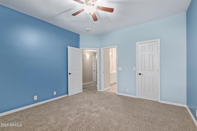 1211 E Desert Flower Ln, Phoenix, AZ 85048 - unfurnished bedroom featuring carpet, ensuite bath, and ceiling fan