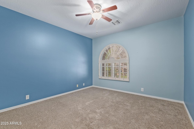 1211 E Desert Flower Ln, Phoenix, AZ 85048 - spare room featuring a ceiling fan, carpet flooring, and a textured ceiling