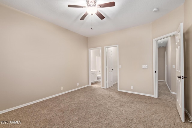 1211 E Desert Flower Ln, Phoenix, AZ 85048 - unfurnished bedroom featuring carpet floors, ensuite bath, and ceiling fan
