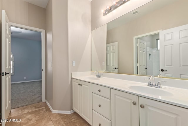 1211 E Desert Flower Ln, Phoenix, AZ 85048 - full bathroom featuring double vanity and tile patterned flooring