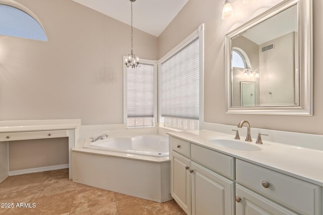 1211 E Desert Flower Ln, Phoenix, AZ 85048 - bathroom with vanity, vaulted ceiling, a garden tub, and a chandelier