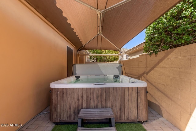 1211 E Desert Flower Ln, Phoenix, AZ 85048 - view of patio featuring a hot tub