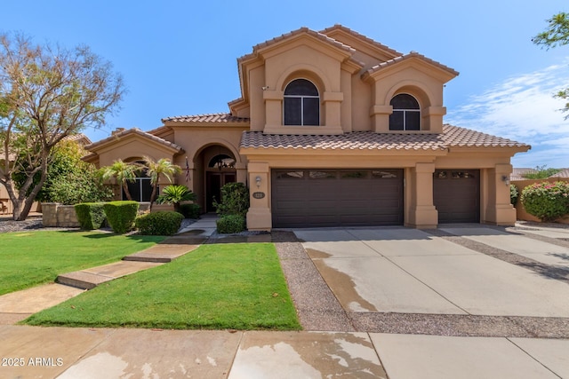 1211 E Desert Flower Ln, Phoenix, AZ 85048 - mediterranean / spanish home with stucco siding, a front yard, a garage, and a tile roof