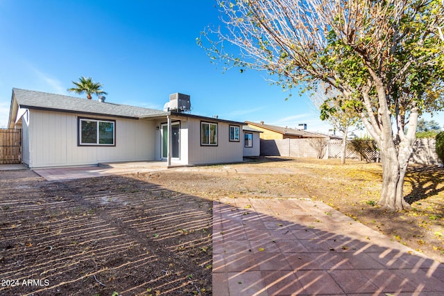 rear view of property with a patio