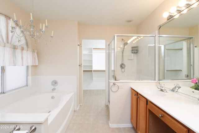 bathroom featuring vanity, plus walk in shower, and tile patterned flooring