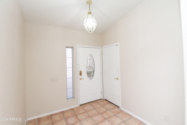 entrance foyer featuring light tile patterned floors