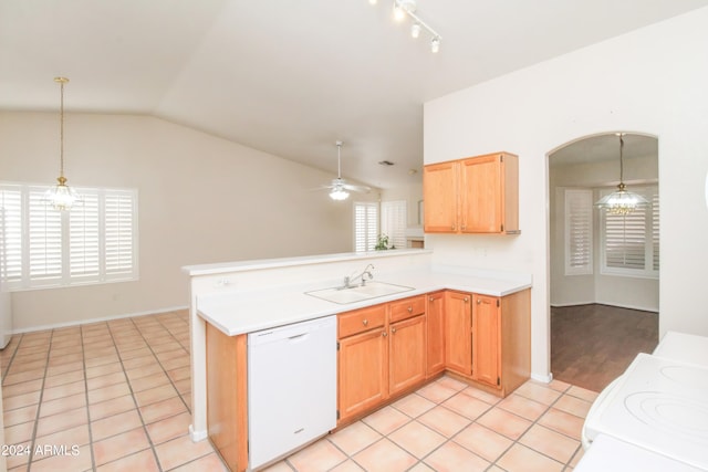 kitchen with ceiling fan with notable chandelier, lofted ceiling, white dishwasher, light tile patterned floors, and sink