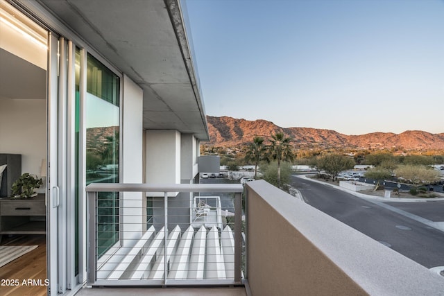 balcony featuring a mountain view