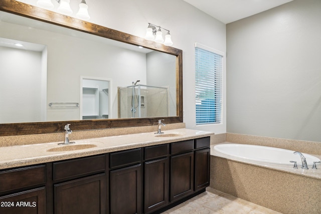 bathroom with vanity, separate shower and tub, and tile patterned floors