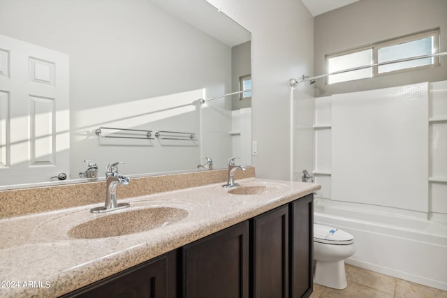 full bathroom featuring shower / tub combination, tile patterned floors, toilet, and vanity