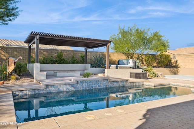 view of swimming pool with a jacuzzi, a patio, an outdoor hangout area, and a pergola