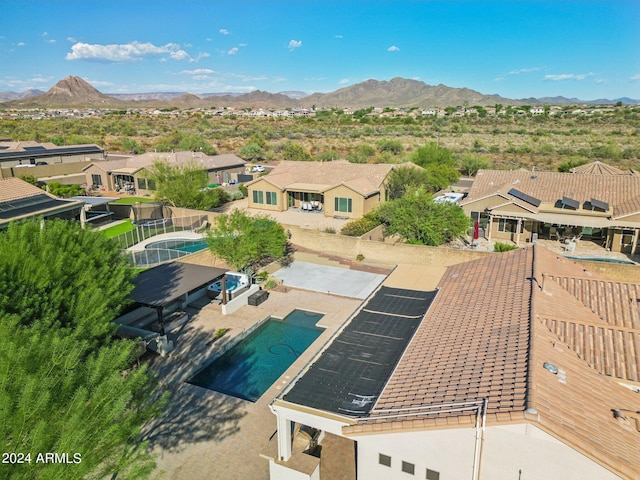 drone / aerial view featuring a mountain view