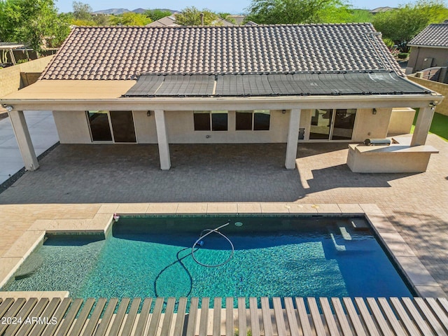 view of pool with a patio area