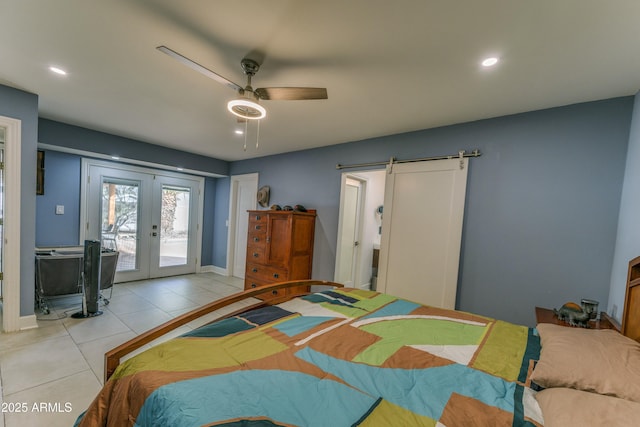 bedroom featuring french doors, light tile patterned floors, recessed lighting, a barn door, and access to outside