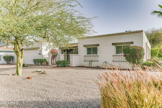 view of front of house with a garage and driveway