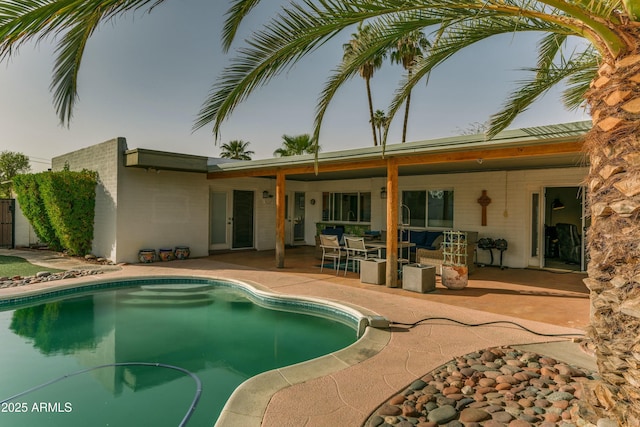 pool featuring a patio