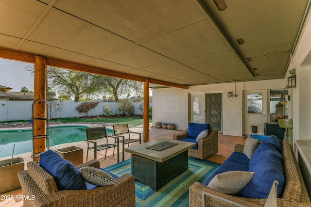 view of patio / terrace featuring a fenced backyard, outdoor lounge area, and a fenced in pool