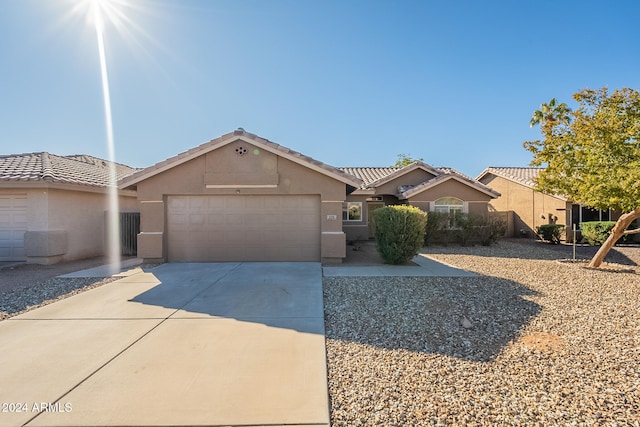 ranch-style house with a garage