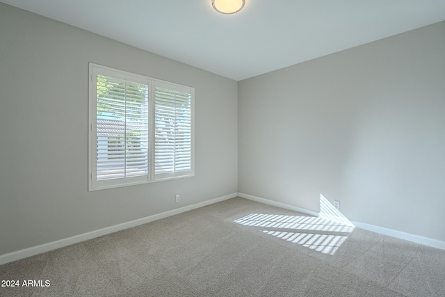 empty room featuring carpet flooring