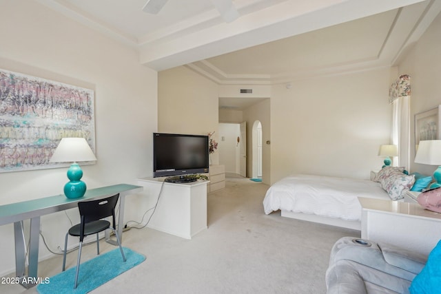 bedroom featuring carpet, visible vents, arched walkways, and ornamental molding