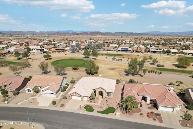 birds eye view of property with a residential view and a mountain view