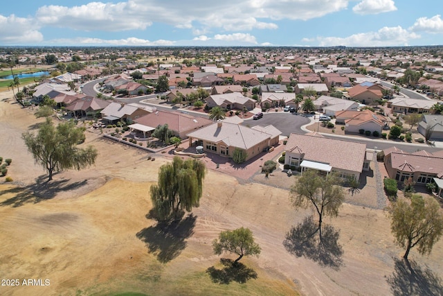 birds eye view of property with a residential view