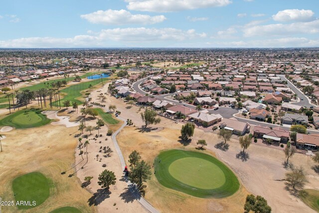 birds eye view of property with a residential view and golf course view