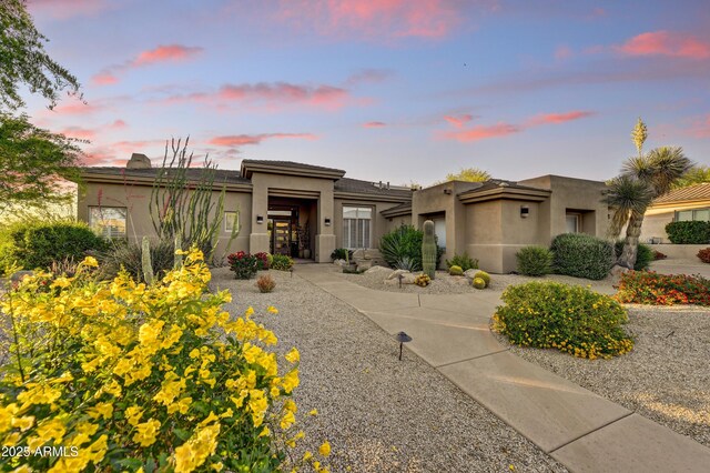 9534 E Monument Dr, Scottsdale, AZ 85262 - view of front of house featuring stucco siding