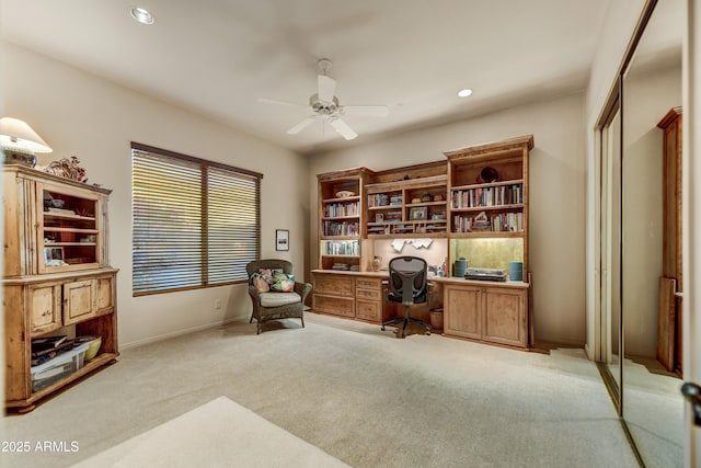 9534 E Monument Dr, Scottsdale, AZ 85262 - office space featuring light carpet, ceiling fan, built in desk, recessed lighting, and baseboards