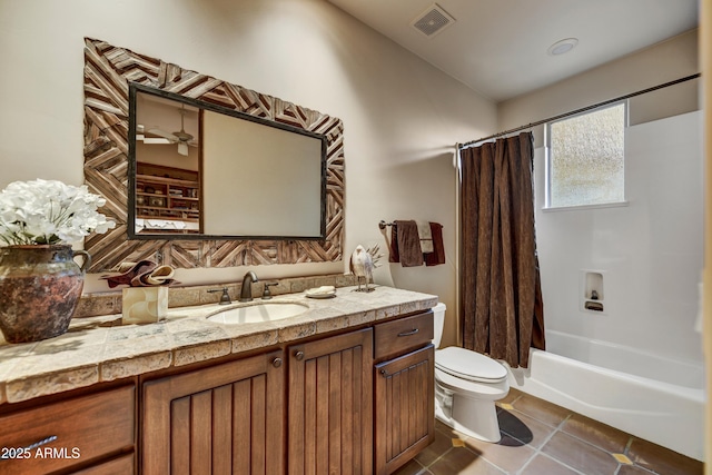 9534 E Monument Dr, Scottsdale, AZ 85262 - full bathroom featuring toilet, vanity, shower / bath combination with curtain, and tile patterned flooring