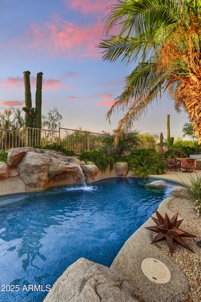 9534 E Monument Dr, Scottsdale, AZ 85262 - view of pool at dusk