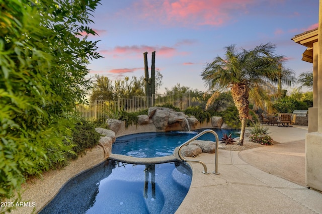 9534 E Monument Dr, Scottsdale, AZ 85262 - pool at dusk featuring a patio