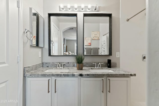 bathroom featuring vanity