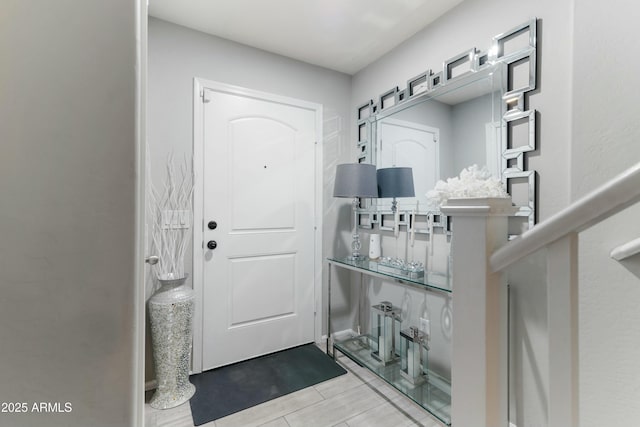 foyer entrance featuring a barn door