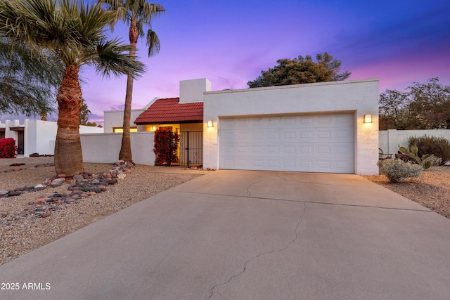 view of front of house with a garage