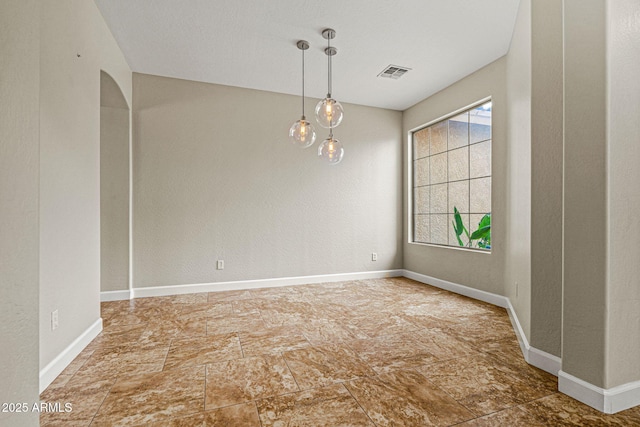 6245 W Maya Dr, Phoenix, AZ 85083 - empty room featuring baseboards and stone finish flooring