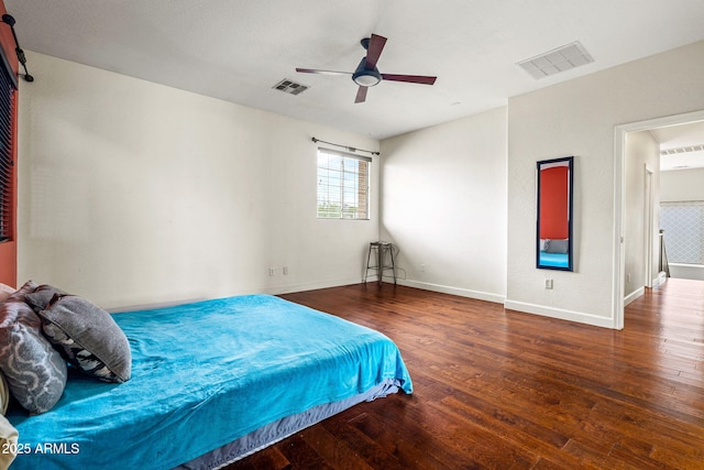6245 W Maya Dr, Phoenix, AZ 85083 - bedroom with wood finished floors, baseboards, and a ceiling fan