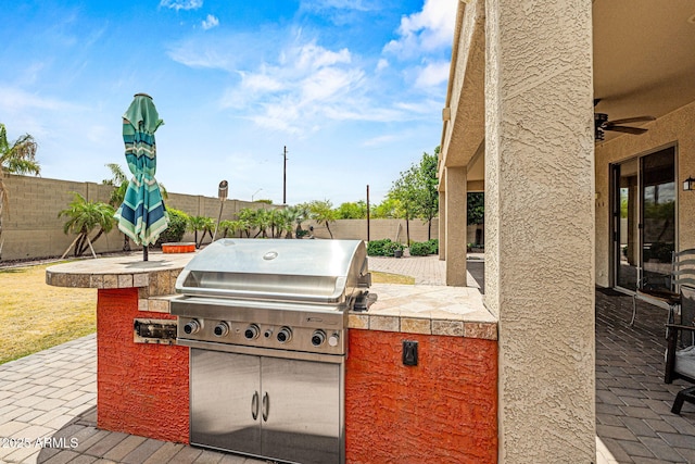 6245 W Maya Dr, Phoenix, AZ 85083 - view of patio / terrace featuring a fenced backyard, ceiling fan, and area for grilling