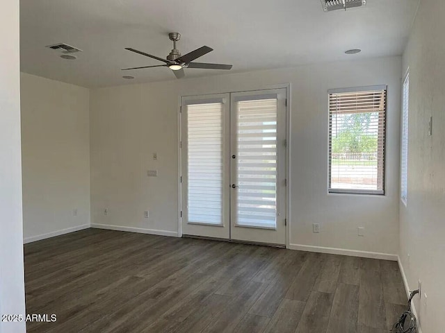 6557 S Classic Way, Gilbert, AZ 85298 - empty room featuring a ceiling fan, dark wood finished floors, french doors, and baseboards