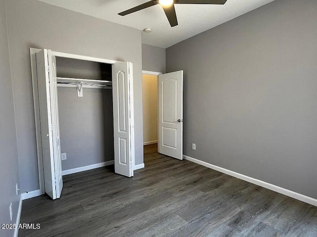 6557 S Classic Way, Gilbert, AZ 85298 - unfurnished bedroom with dark wood-style flooring, a closet, baseboards, and ceiling fan