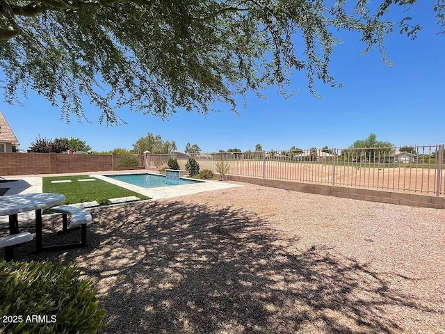 6557 S Classic Way, Gilbert, AZ 85298 - fenced backyard with a patio area